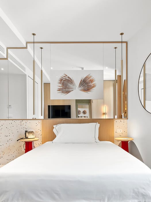 Detail of single room with bed